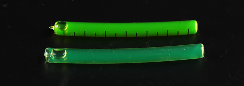 Two glass tubular bubble level with one has scale and the other don't have scale.